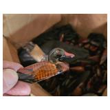 box of wooden ducks