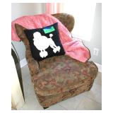 Armchair features a tapestry-style floral fabric