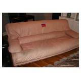 peach colored sofa and chair