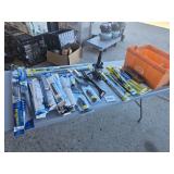 12 wipers, sun shades, cooler cords, jack, brush