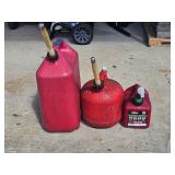 3 plastic gas cans