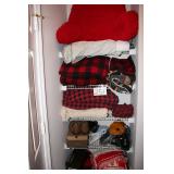 Reading pillow, plaid blankets, men