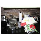 Hand towels, silverware, toaster, mug trees, etc