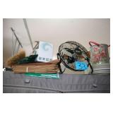 Metal fan, watering can and plates