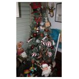 Whimsical Christmas tree, Santa statues, etc