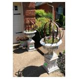 Flower pot urn on pedestals with metal obelisks