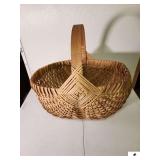 LARGE WOVEN CORNER CLOTHES BASKET RESEMBLES SPLIT OAKS BUTTOCKS BASKET FARM HOUSE - NICE SHAPE - CLEAN - (UPSTAIRS)