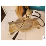 MAKITA LS1030 10" MITER SAW 50-60HZ - 4600 RPM - SAW DOES RUN - NEEDS CLEANING - RUBBER CORD IS LOOSE AT BASE OF SAW - (SHOP)