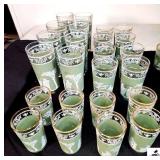 VINTAGE JEANNETTE GRECIAN PIECES VINTAGE JEANNETTE GREEN WEDGEWOOD HELLENIC GRECIAN PITCHER WITH ICE LIP AND (32) JEANNETTE GRECIAN GREEN GLASSES - (UPSTAIRS)