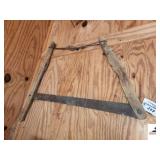 ANTIQUE MANUAL HAND CROSS CUT WOOD BUCK SAW 36"X 28" - WIRE TOP BRACE - ONE OF THE HANDLES IS DAMAGED - (GARAGE)