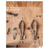 PAIR OF HORSE HANGS WITH HARNESS RINGS WOOD AND METAL - 3 CURRY COMBS, LETHER BRASS COLLAR THAT IS DRY ROTTED - NEEDS REPAIR - (GARAGE)