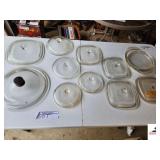 BOX OF PYREX BOWL LIDS-MISC SIZE AND SHAPE NO BOWLS INCLUDED(GARAGE)
