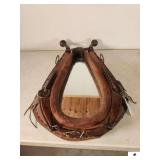 LEATHER HORSE COLLAR EXCELLENT CONDITION FOR AGE - OAK HANGS WITH LARGE BRASS KNOBS - GOOD LEATHER BANDS AND MIRROR - COLLAR HAS BEEN USED - SHOWS SLIGHT WEAR ON BACK SIDE - LEATHER HAS DRIED AND DIVI