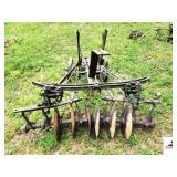 HORSE DRAWN RIDING DISK DOUBLE FRONT WHEEL - STEEL DEPTH LEVERS - 3 BLADES PER SIDE - OTHER BLADES MISSING - SEAT MISSING - ONE OF THE FRONT WHEELS RUSTED IN TWO PCS. (OUTSIDE)