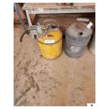 VINTAGE YELLOW SAFETY GAS CAN APPROVED BY UNDERWRITER LAB INC 8344L86 - HAS GOVERNMENT STAMPED ON IT - PAINT IS WORN - SHOWS SOME RUST AND DENTS - INCLUDES GALVANIZED OIL CAN - SHOWS SOME USE WEAR AND