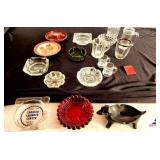 (10) ASHTRAYS - GLASS & PLASTIC SOME ADVERTISEMENT TRAYS - SMOKEY MTN. - MINITURE MUGS - CUPS - BOWLS - RUBY RED ASHTRAY - DACHSHUND ASHTRAY - GLASS VASE - (GARAGE)