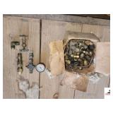 PLASTIC CRATE OF PIPE UNION AND PARTS - NEW AND USED - ELECTRIC WIRE CLAMPS - PLASTIC BUCKET OF PARTS - GALVANIZED AND BRASS PLUMBING SUPPLIES -TROPHIES -  (IMP. SHED)