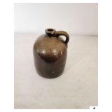 STONEWARE JUG W/ HANDLE - BROWN AND GOLD SPLATTER DESIGN - 7" BASE - 10" TALL -  (LR)