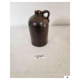 STONEWARE JUG W/ HANDLE - BROWN - 6 1/2" BASE - 11" TALL - (LR)