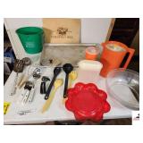 COOKING UTENSILS SPOONS - LADLE - CAN OPENERS - SPATULAS - LRG ALUMINUM BAKING PAN - PLASTIC BOWLS - TEA PITCHER - PLASTIC CONTAINERS - BUCKET - DIXIE BANQUET TABLECLOTH - PARTIAL ROLL (UPSTAIRS)