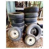 BOAT TRAILER RIM AND TIRE 4.8-12 5 HOLE - (2) RIMS - 5 HOLE - HANCOCK TIRE P205/75/R14 - (12) ADDITIONAL TRUCK TIRES (IMP. SHED)