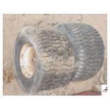 (2) TRAILER TIRES & RIMS (SMALL) PM STRONG 18X9X52 - (IMP SHED)