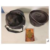 LODGE SEASONED DUTCH OVEN 12 DCO - FOOTED - BAIL HANDLE - HAS CARRYING CASE - (GARAGE)