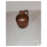 STONEWARE JUG W/ HANDLE - BROWN - 6" BASE - 8" TALL - (LR)