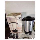 GE COFFEE URN 42-CUP CAPACITY WITH CORD CROCPOT SLOW COOKER WITH CORD - (2) MEAT RACKS - SPATULAS - BBQ FORK - MISC SILVERWARE - UTINSIL TRAY- (UPSTAIRS)
