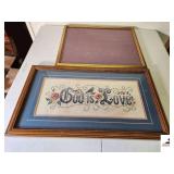 GOLD PICTURE FRAME WITH GLASS AND BACKING CROSS STITCH PIECE WORK "GOD IS LOVE" WITH BLUE BACKING IN WOODEN FRAME (TRAILER)