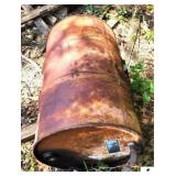 HORIZONTAL GAS TANK ON SLIDES CONDITION UNKNOWN - (3) 55 GALLON DRUMS - SMALL OIL DRUM - USED TRUCK BED LINER - ORANGE DRUM APPEARS FILLED WITH OIL - DO NOT DUMP OUT - & PALLET OF 5 GAL.BUCKET - 2 1/2