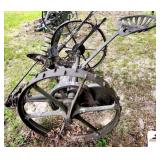 HORSE DRAWN SICKLE MOWER MCCORMICK CHICAGO USE - CLEAT WHEELS - IRON SEAT - ONE SPOKE MISSING - SICKLE BAR NO BLADE - WOOD HANDLE DETERIORATED - (OUTSIDE)