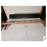 (2) OAK GALLERY RAILS PLATE GROOVES - ONE HAS SPINDLE GALLY RAILS - ONE NATURAL COLOR, ONE BLACK (UPSTAIRS)