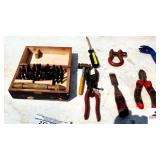 SET OF METAL STAMPS WITH BRASS TOOL & HAMMER PAIR OF HOG RINGERS - WOOD CHISEL - CUTTERS - NAIL PULLER - SCREW DRIVER - PARTS TO A FOOD CHOPPER (HANDLE IS BROKEN) - (NE BLDG 5)