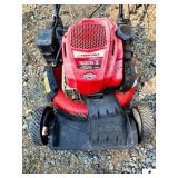 TROY-BILT TB280ES PUSH MOWER WITH LEAF BAG VARABLE SPEED - HAS COMPRESSION - ROPE WINDS UP SLOWLY - ELECTRIC START - BRIGGS & STRATTON 725EX MOTOR - (NE BLDG 5)