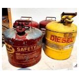 (4) GALVANIZED FUEL CANS (3) GAS CANS - (1) DIESEL CAN - (NE BLDG 5)