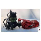 DRUMMOND SUMP PUMP WITH HOSE - (RUNS) (NE BLDG 5)