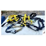 (2) GUARDIAN SHOCK ABSORBANT CLIMBING HARNESSES BRASS RINGS AND SNAPS - BLUE HARNESS HAS USER CAPACITY RANGE 130-310LBS - MAXIMUM FREE FALL 12FT. - 1350LBS AVERAGE ARRESTING FORCE - WEB DEVICES HOUSTO