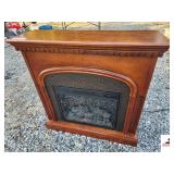 MAHOGANY ELECTRIC FIREPLACE WITH LOGS (LIGHTS UP AND WORKS) - (BLDG 6)