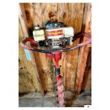 EARTHQUAKE GAS POST HOLE DIGGER - WITH AUGER - HAS COMPRESSION - (BLDG 4)