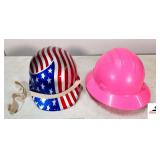 (2) HARD HATS- (1) AMERICAN FLAG COLOR- (1) PINK IN COLOR