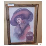 COCA-COLA PRINT WITH LADY IN FUR COAT AND HAT- "DRINK COCA-COLA, DELICIOUS AND REFRESHING"- IN PRIMITIVE WOOD FRAME- 20 3/4" WIDE- 30" TALL