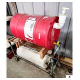 (2) PLASTIC OIL BARRELS ON ROLLING 2 SHELF RACK- RACK INCLUDED- BARRELS EMPTY