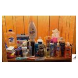 SHAMPOO - PEROXIDE - JEWELRY CLEANER - HAIR SPRAY - HAND SOAP - BANDAIDS - TOOTHBRUSH - ULTRASONIC CLEANER (LID HINGE BROKEN) - TRAVEL IRON - (2) MENS TOLIETRY BAG - DURMASUCTION PORE CLEANER - BABY P