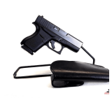 GLOCK 43 PISTOL  9X19 SEMI AUTO BLACK -  ALMOST MINT - TOP OF CHAMBER SHOWS VERY LITTLE WEAR - BLUING EXCELLENT - JM4 TACTICAL LEATHER HOLSTER W/ MAGNETIC CLIP - SN ABNW523