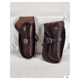 (2) VINTAGE LEATHER REVOLVER HOLSTERS HAND TOOL - TOP SAFETY FLAP IS MISSING - TOOL WITH STAR -