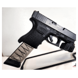 GLOCK 29 PISTOL SEMI-AUTO 10MM BLACK IN COLOR - EXTENDED PLASTIC MAG - BARREL HAS SLIGHT BLUING RUB - ATTACHED LASER - APPEARS BATTERY IS DOWN - SN TND758
