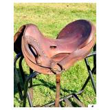 VINTAGE ENDURANCE STYLE SADDLE- LEATHER, W/ SOME DESIGNS - CANTLE HAS RUBS- ROSETTE MISSING, LOOP TORN LOOSE- NO STIRRUPS- NO GIRTH