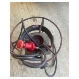 Cast iron fish cooker with regulator