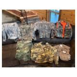 7- assorted camouflage shirts and vests